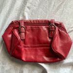 red faux leather bag Photo 1