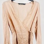 ZARA woman silk feel blouse size small
Cross over tie Photo 0
