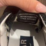 Golden Goose Women's Super-Star in black nappa and glitter with glossy black leather star Photo 2