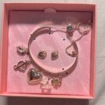Juicy Couture Gold Charm Bracelet/Earring Set Photo 0