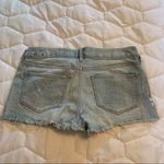 EXPRESS low rise Shortie denim shorts Size 4 Photo 1