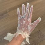 New white lace wrist length ruffle gloves with pearl embellishments Photo 0