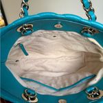 Kate Spade New York quilted tote bag in teal. Photo 5