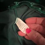 Women Flare Shiny Trousers Laser Metallic Wetlook Ruffle Wide Leg Pants,Green Size L Photo 1