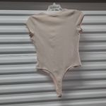 Calvin Klein Jeans Bodysuit Top Womens Medium Beige Short Sleeve V-Neck Photo 1