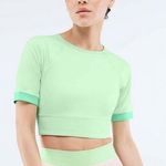 Fabletics Avah Color Block Cut Off Sleeve Crop Top NW Detailed Tag Photo 0