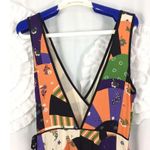 Urban Outfitters  Bold Patchwork Jumpsuit Crossover Deep V Size 4 Orange Black Photo 4