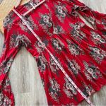 Free People red floral boho bell sleeve top Photo 6