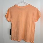 Orange pullover. New with tag. Brand Love Dazed. Size L. Size L Photo 1