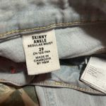 H&M light blue skinny jeans from  Photo 3