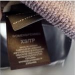 The North Face Women's Dark Gray Ski Jacket Size XS / TP Looks amazing in person picture do you know justice smoke free home? If you have any questions, let me know. Sleek and warm ski jacket. Ideal for winter sports. Durable and stylish design. Photo 7