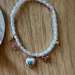 Gold and White Floral Jewelry Set Photo 2