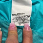 Nike DriFit Teal Short Sleeve Top size Small Photo 3