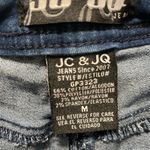 Trendy Dark Blue Flare Jeans with Ripped Knees Size M Photo 5