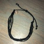 Pura Vida Black  Bracelet With Gold Beads Photo 0