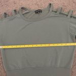 Almost Famous  Cut-Out Long-Sleeve Top Photo 6