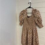 1. State  Smocked Puff Sleeve Mini Dress in brown floral Photo 1