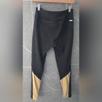 Alala Black Leggings with Gold Accent Photo 1