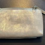 Joy Susan silver wristlet purse with credit card inserts and pocket. GUC. Photo 3