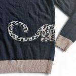 Leopard Lightweight Sweater – Size Small
Stylish & Unique | Subtle Sparkle | Black Photo 3