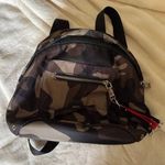 Brown and Black Camouflage Backpack with Zippered Compartment Photo 0