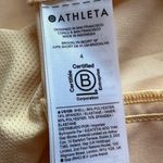 Athleta light yellow mini tennis skirt size 4 Photo 5