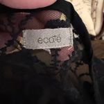 Ecote NWOT Black Lace Sleeve Tunic with Criss Cross Neckline and Semi Sheer Back Photo 5