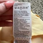 Athleta light yellow mini tennis skirt size 4 Photo 6