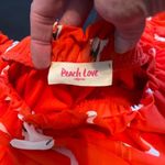 Peach Love California Peach Love off the shoulder cow skull ruffle orange crop top Photo 3