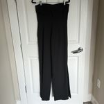 The Vintage Shop Adorable, sleeveless black jumpsuit, one leg with pocket size large Photo 4