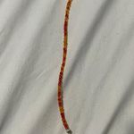 red and orange beaded bracelet/anklet Photo 0