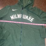 Nike  Green Milwaukee Hoodie woman’s sz M Photo 3