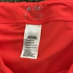Adidas  golf skort skirt shorts women size LARGE neon orange and purple Photo 1