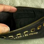 Michael Kors  Womens Saffiano Leather Stud Long Zip Clutch with gold tone studs. Photo 8