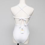 Becca . Modern Edge Cutout Ribbed One-Piece Swimsuit. Photo 2