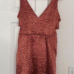 Sweet Storm cheetah print mini dress with cutouts. Photo 0