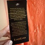 Bebe  Lace Corset Bustier Midi Dress Coral Pink NWT Size 6 Sold Out Photo 6