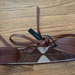 B-low the Belt  brown belt Photo 3