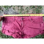 BDG  Low Rise Dolphin Denim Shorts Women's 29 Burgundy Distressed‎ Frayed Hem Photo 4