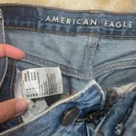 American Eagle Distressed Raw Hem Mom Jeans Photo 1