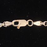 Sterling silver and peridot lucky charm bracelet. Photo 6