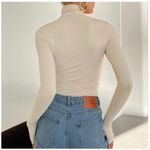 Princess Polly Turtleneck Photo 1