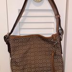 Coach logo brown purse Photo 0