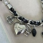 Silver and Black Charm Necklace Mixed Media Photo 2