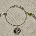 ALEX AND ANI Bracelet - Starbucks - Tinkerbell - bangle, adjustable, charms, silver tone. 2nd Starbucks on the right (Peter Pan movie reference) gently used - no flaws. Smoke free home. Photo 0