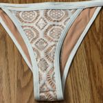 Ris-k Nude And White Bikini Bottom Photo 2