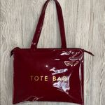 Glossy Red Tote Bag with Gold Lettering the perfect traveling bag Photo 6
