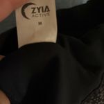 Zyia  Active Black Flower Power Cut Out Racerback High Neck sport bra Photo 4