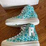 Ruco Line women's size 35 IT hidden wedge heel ' R ' logo print leather sneakers White Photo 3