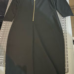 Elegant Black Dress with Gold Zipper Size L Photo 0